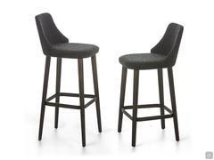 Neva high-backed upholstered stool, upholstered in fabric legs in heat-treated wood and bronze painted footrests