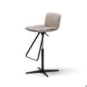 Axel leather stool with feet rest in black embossed metal