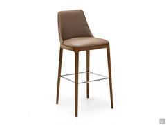 Michela stool with solid-wood structure and tall backrest. Leather upholstery and solid-wood legs in Canaletto Walnut stained ash wood.