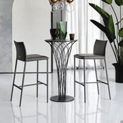 Norma by Cattelan pair of upholstered stools with metallic legs matched to Nido Bistrot table