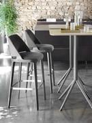 Pair of Velis stools with upholstered seat and wooden backrest matching the legs, in the 'high' snack-top version