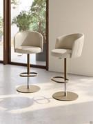 Leslie standing and swivel stools with metal frame and upholstered seat covered in leather, fabric, velvet or faux leather