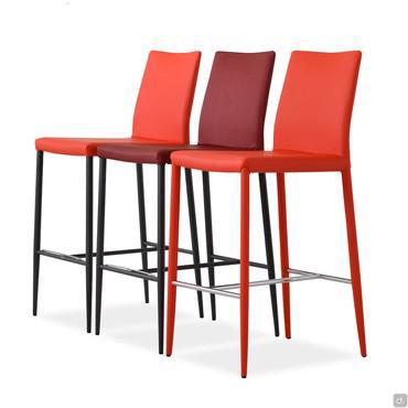 Akira 2.0 is an entirely upholstered bar stool available in fabric, faux-leather or leather; also with metal legs