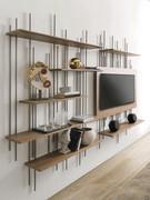 Wall-mounted TV stand with shelves Waterfall, also offered here accompanied by the bookcase module.