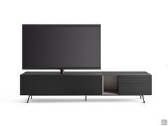 California low TV cabinet with curved metal feet and matte lacquered open compartment contrasting with oak frame. TV on 65-inch Vesa stand, on 240 cm wide composition.