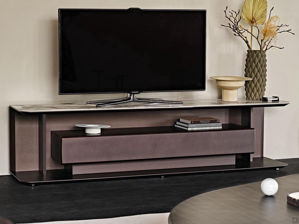 Prominent feature of the TV stand cabinet with drawer Award by Cattelan is the large central drawer with a flap front