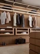 Horizon Lounge walk-in wardrobe: veneered backs, veneered drawers with glass fronts and LED light under the top shelves