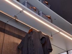 Shelf with milled LED and hanging tube