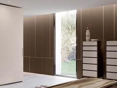 Lounge Boiserie wall panels applied to an entire wall in the sleeping zone, with applied metal inserts