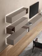 Royal wall unit with wall units and wall-hung base units with flap, coordinated in terms of front workmanship and finish. Opening is via the recess made in the top