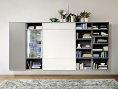 Way 14 wall system with sliding doors to conceal the TV compartment and storage units with drawers