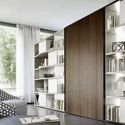 Wooden living room wall system Way 16, the wooden sliding doors hides the TV if necessary