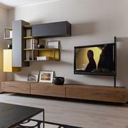 Modern living room wall system with TV shaft FreeHand 09 with numerous container spaces. Ideal for walls at least 320 cm long.