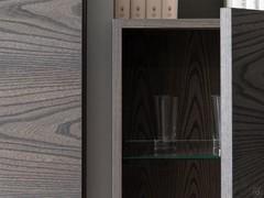 Detail vertical wall units with wooden structure and internal glass shelves 