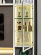 Bookshelf compartment turned into showcase or glassware. Glass door with thin handle, dividing glass shelves, LEDs.