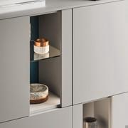 Detail of two-tone open compartment with clear glass shelf