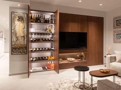 Bar cabinet equipped with shelves for bottles and glasses, elegantly hidden by doors - customer photo