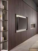 Lounge wall system with TV module in the exclusive solid wood finish TAMMAS Wave, on available on projects.