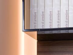 Detail of the smoked glass shelves on the Replay 04 wall