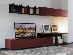 Plan customised modular wall system with matte lacquered TV stand and open hanging bookcase