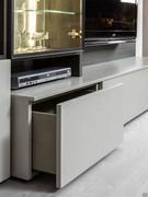 Detail of floor-standing base unit with lacquered front and particle board drawer sides