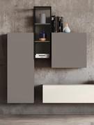 Composition of Freehand opaque lacquered hinged wall units, in square and rectangular formats, interspersed with an open wall unit with iron frame