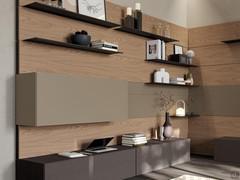 Composition with corner development of Freehand elements. Boiserie panels with metal shelves, drop-down wall unit and floor-standing base units