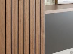 Details of the slatted finish on the wooden doors of the Plan 38 wall unit system