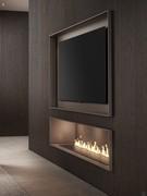 Three-quarter view enhancing the elegant contrast between the wood veneer of the fronts and the metal-effect lacquer of the TV compartment and the open compartment below, here equipped with an optional water vapor fireplace 