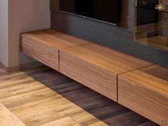 Drop-front cabinets and drawers in the Freehand 13 wall unit, available in matte lacquer or veneered in fine woods offered here with "in bilia" machining (see Info for your Purchase)