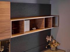 Freehand 13 wall bookcase element, available in 480 cm version accompanied by the desk