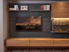 Wall paneling with hanging TV window, offered here on the Freehand 13 wall in the exclusive lava stone finish