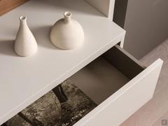 The drawer sides of Way 28 wall unit are always in a jute textured melamine finish, while the outer frame is a choice of melamine, lacquer or veneered woods