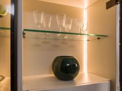 The Way 28 wall unit cabinets can be accessorised with a vertical LED strip, to illuminate the compartments