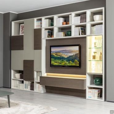 Wall system with bookshelf and TV panel Way 25. It is completed with opened book-shelf column, compartments with doors and showcase wall unit.