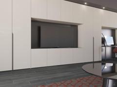 Living room module with Wide doors, combined with back panel, wall units and full-height hinged modules to create a TV stand composition