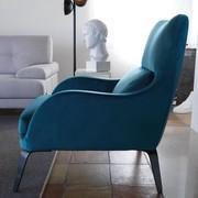 Fauteuil avec accoudoirs arrondis Mabel