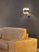 Lampe Futura en version murale avec abat-jour en verre ambré satiné et transparent avec anneau en laiton