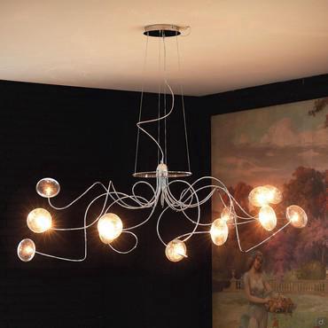 Lampe à suspension avec bras métalliques et abat-jour en verre cristal Oktopus de Cattelan