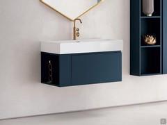 Console Tahiti avec base à un grand tiroir avec compartiment ouvert latéral, un accessoire Atlantic disponible pour compléter et personnaliser votre propre composition salle de bain