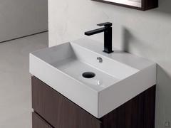 Lavabo console Elegance en céramique blanc brillant sur base à deux tiroirs