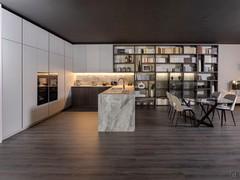 Cuisine d'angle contemporaine avec finitions effet marbre, ciment et bois