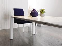 Table de cuisine extensible avec plateau en céramique sur verre et pieds en finition blanche