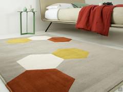 Acapulco Détail du tapis avec motif hexagonal coloré