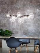 Lampada a sospensione a 9 punti luce con sfere in cristallo trasparente e struttura metallica nickel nero satinato