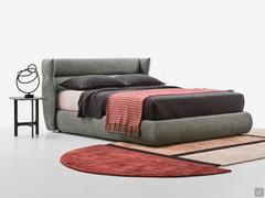 Letto di design con testiera avvolgente Destin, disponibile rivestito in tessuto, velluto, similpelle o pelle 