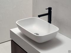 Lavabo tutto-fuori Hub in Corian 