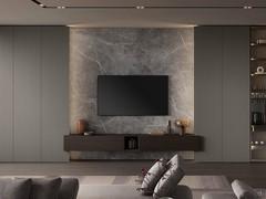 Lounge Boiserie in pietra ceramica Laminam grey abbinata a basi sospese impiallacciate rovere carbon ed armadiature laterali con ante laccate opache titanio lavorate in 10:10