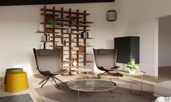 Progetto soggiorno relax con zona conversazione arredata con eleganti poltroncine e libreria in legno modulare.