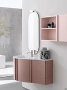 Specchio da bagno ovale con faretto Led Sampi con composizione a base curva